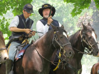 1st Sgt changes cylinder while mounted